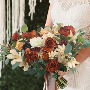 A bold mix of rust, terracotta, and gold-toned dried flowers –